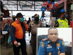 Menuju New Normal: Satpol PP Kota Tanjungpinang bersama Stakeholder Sosialisasikan Penggunaan Masker pada Pedagang
