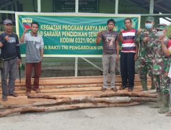 Kodim 0321/Rohil Laksanakan rehab Sarana Pendidikan Yayasan perguruan Al Husin Madrasah ibtidaiyah.