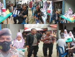 Kapolsek Jangkat (Iptu Deni Saepudin) Melaksanakan Vaksinasi Masal Di pasar Balai Melingkung