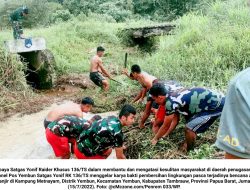 Antisipasi Bencana Banjir, Satgas Yonif RK 136/TS Lakukan Normalisasi dan Pembersihan Saluran Air