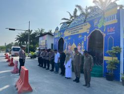 Personel Pos PAM Ops Ketupat Lancang Kuning 2025 di Exit Tol Kandis Utara Polres Siak Tetap Siaga untuk Pengamanan Idulfitri 1446 Η