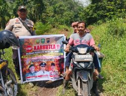 Polsek Tualang Laksanakan Patroli Roda Dua dan Sosialisasi Antisipasi Karhutla di Kampung Pinang Sebatang Timur.